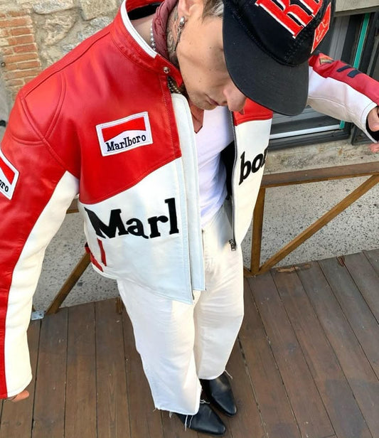 Person wearing a red and white racing suit with Marlboro branding.