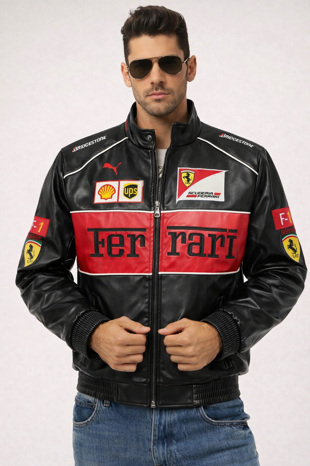 Man wearing a Ferrari leather jacket with various logos on a white background